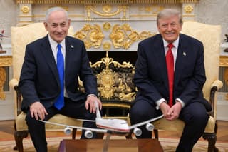 This handout picture released by the Israeli Government Press Office (GPO) Shows Israel's Prime Minister Benjamin Netanyahu (L) posing for a picture with US President Donald Trump in the Oval Office of the White House in Washington DC, ahead of their meeting on July 28, 2026. Israeli Prime Minister Benjamin Netanyahu visited the White House on July 28 for his first in-person talks with President Donald Trump since the Iran war began, as the leaders sought to patch over public disagreements on the conflict. (Photo by GPO / AFP) / - Israel OUT / RESTRICTED TO EDITORIAL USE - MANDATORY CREDIT "AFP PHOTO / GPO / HANDOUT / " - NO MARKETING NO ADVERTISING CAMPAIGNS - DISTRIBUTED AS A SERVICE TO CLIENTS