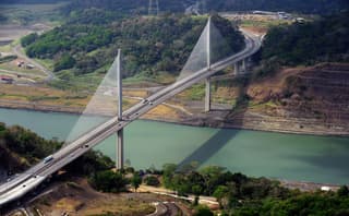 General view of the Centenary Bridge over the Panama Canal, near Panama City on February 23, 2013. AFP PHOTO/ Rodrigo ARANGUA (Photo by RODRIGO ARANGUA / AFP)
