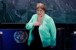 Chile's former president and candidate for the United Nations Secretary-General position Michelle Bachelet arrives to the stage to participate in a debate at the UN General Assembly Hall in New York, on July 23, 2026. Chiles former president Michelle Bachelet, Senegals former president Macky Sall, Costa Rican economist and Secretary-General of UNCTAD Rebeca Grynspan, Argentine diplomat and Director General of the International Atomic Energy Agency (IAEA) Rafael Mariano Grossi, Ecuadorean diplomat and former President of the UN General Assembly Maria Fernanda Espinosa, and Guyanas former foreign minister Carolyn Rodrigues are vying to become the next UN Secretary-General. (Photo by Leonardo MUNOZ / AFP)