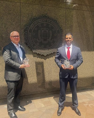 Michael Soto, subdirector del OIJ y Carlo Díaz, fiscal general, durante una visita a Washington en julio de 2025. CRH/OIJ