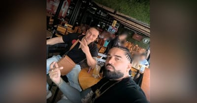 Alias "Mufasa", a la izquierda de la foto, fue una de las víctimas del ataque armado. La fotografía la tomaron horas antes del crimen.