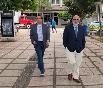 El abogado Federico Campos y el director del OIJ suspendido, Rándall Zúñiga.
