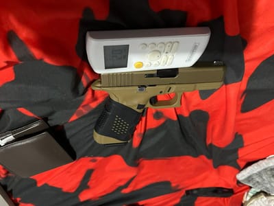Arma decomisada en los allanamientos. OIJ