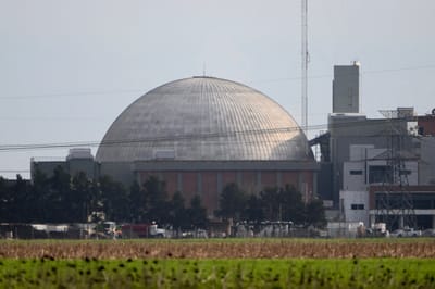 FILES) General view of Atucha I nuclear power plant in Lima, Buenos Aires province, taken on September 18, 2025. Argentina announced on July 7, 2026 the construction of a new nuclear reactor in Buenos Aires with a 1.2 billion dollar private investment, as the National Atomic Energy Commission faces a labour dispute over layoffs denounced by its workers. (Photo by Luis ROBAYO / AFP)